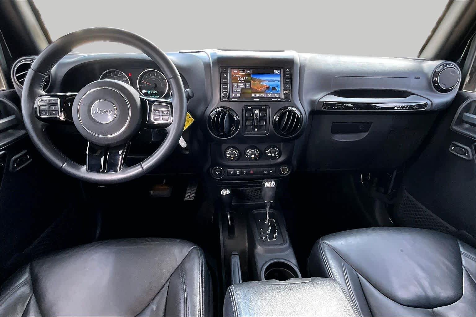 Used 2015 Black Clearcoat Jeep Altitude image 11