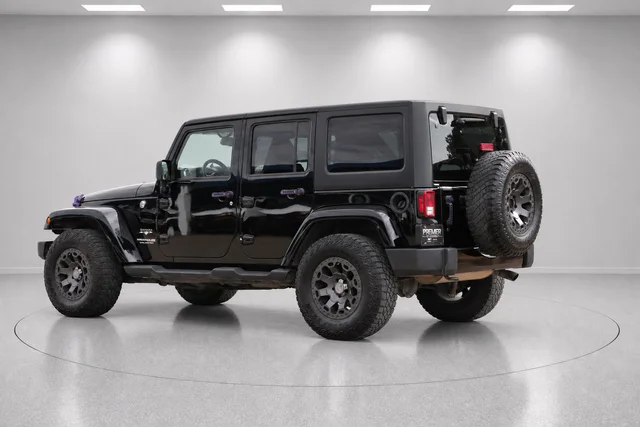 Used 2018 Black Jeep Unlimited Sahara image 5