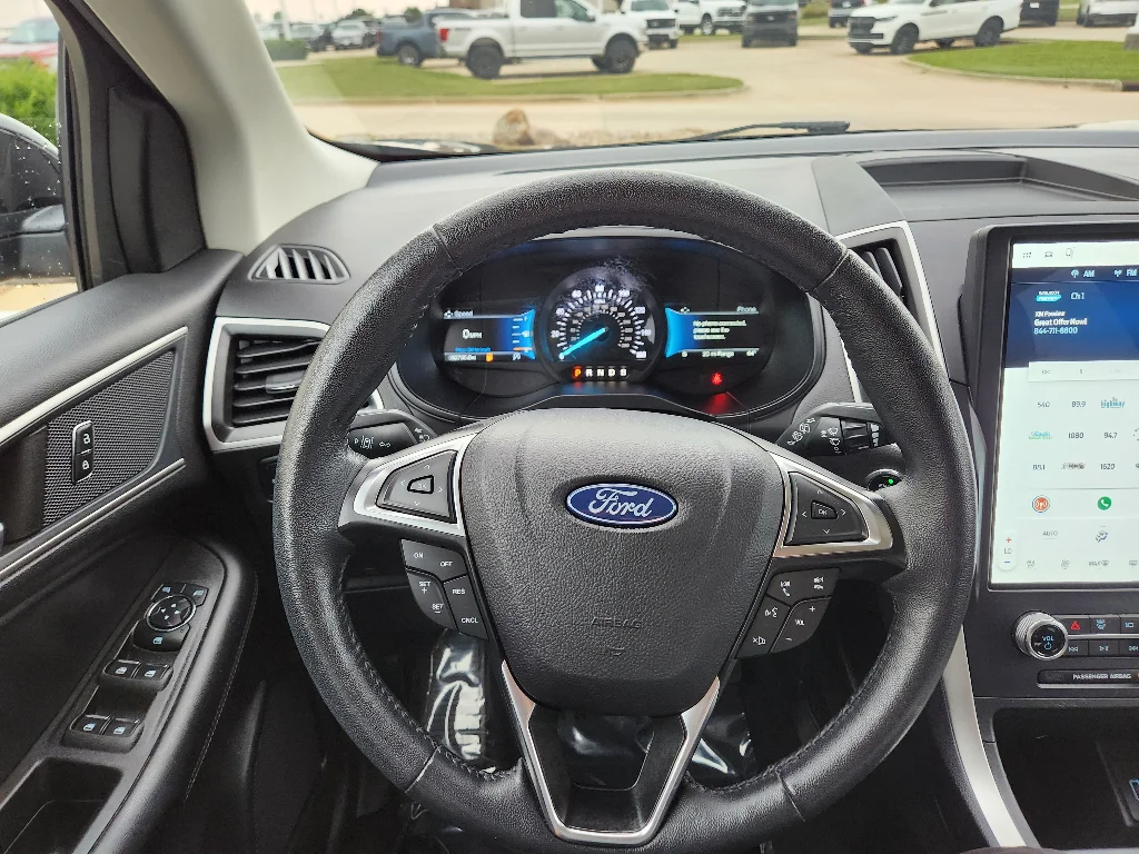 Used 2024 Agate Black Metallic Ford SEL image 13
