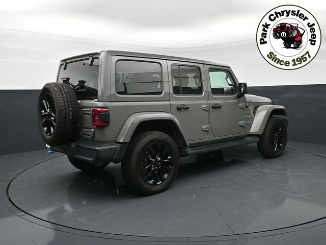 Used 2022 Jeep Wrangler Unlimited Sahara 4XE with VIN 1C4JJXP65NW258426 for sale in Burnsville, Minnesota