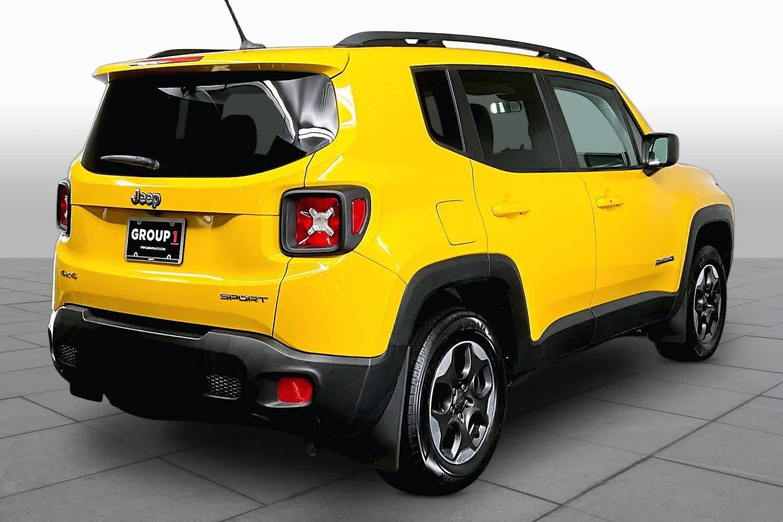 Used 2017 Solar Yellow Jeep Sport image 13