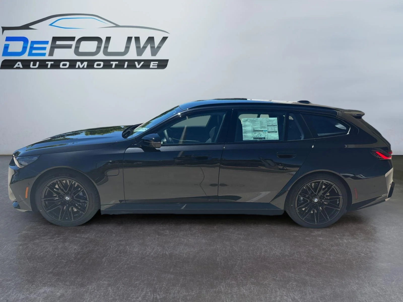 New 2027 Black Sapphire Metallic BMW TOURING image 18