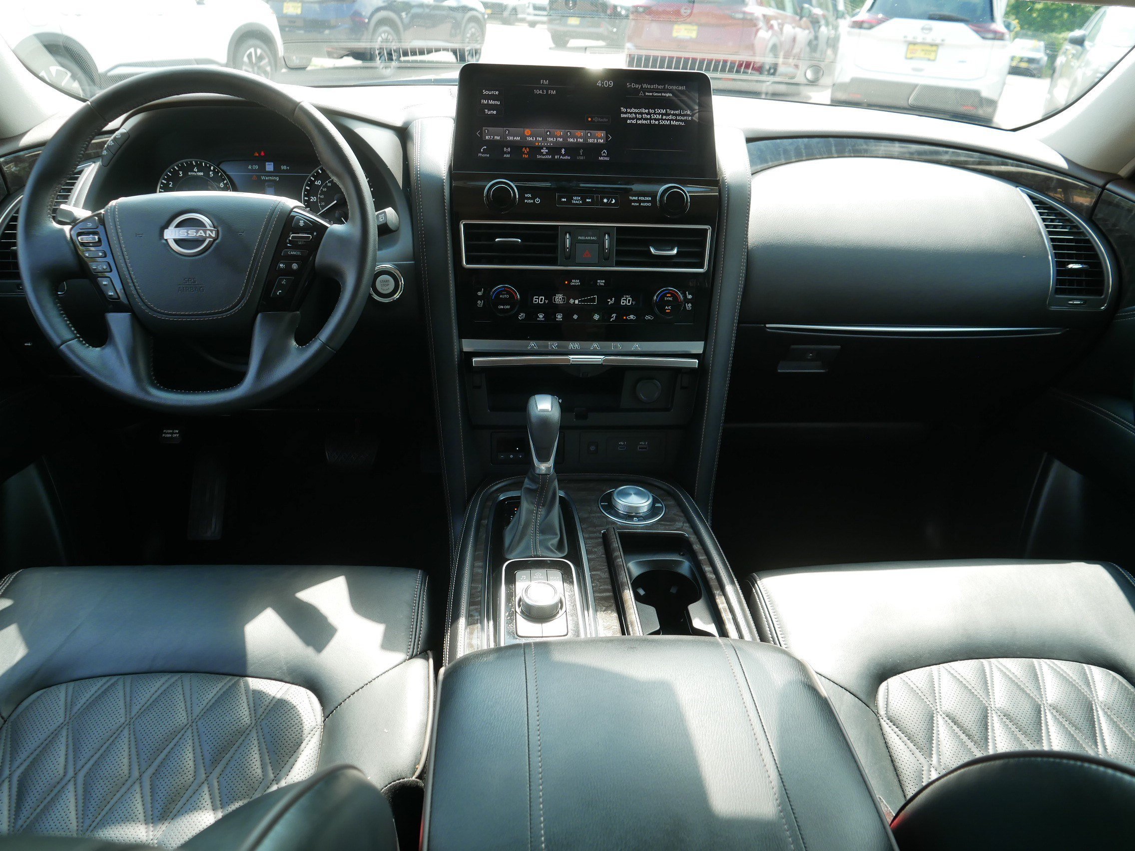 Used 2024 Super Black Nissan Platinum image 10