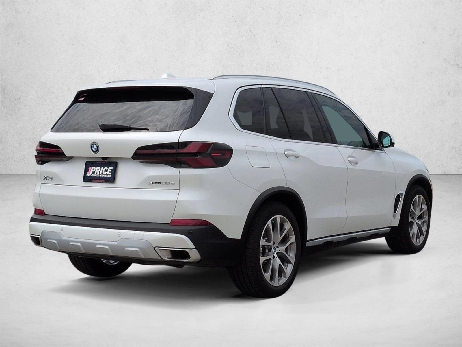 Used 2026 Mineral White Metallic BMW xDrive50e image 5