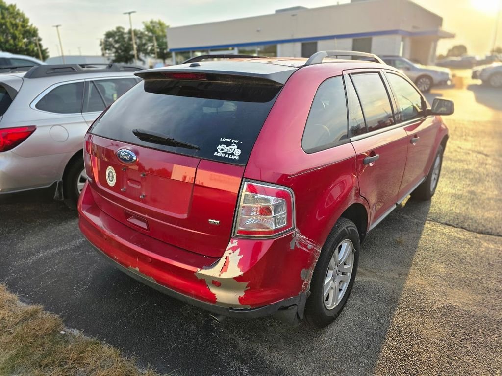Used 2010 Red Candy Metallic w/Tinted Clearcoat Ford SE image 4