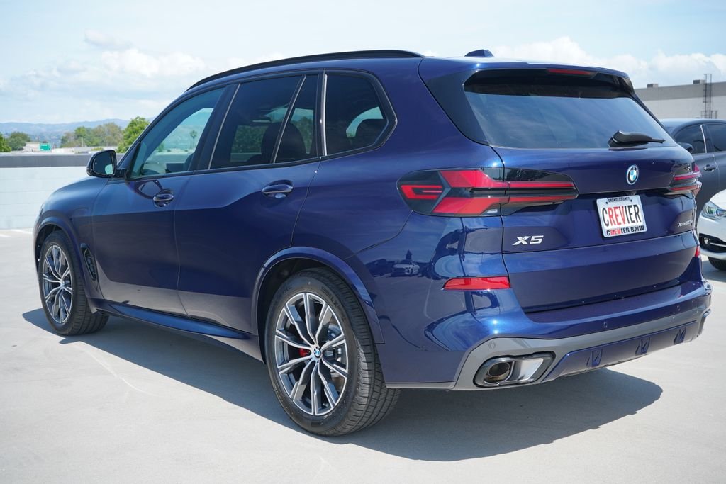 New 2026 Tanzanite Blue II Metallic BMW xDrive50e image 8