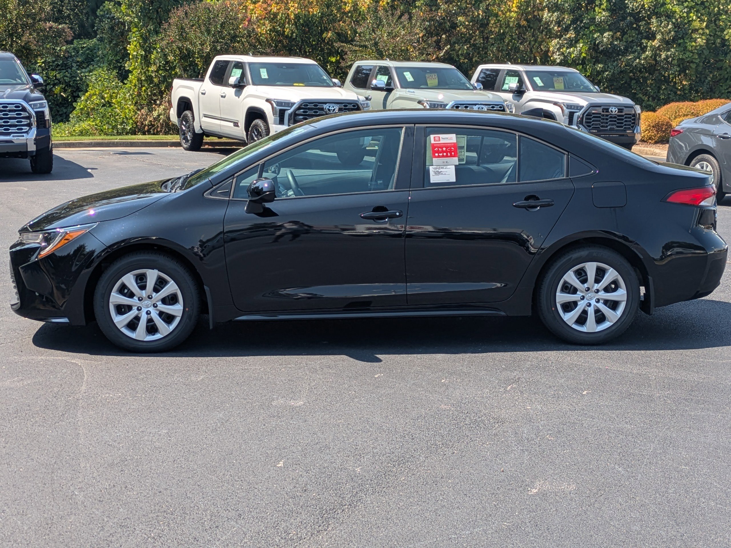New 2026 Black Toyota LE image 7