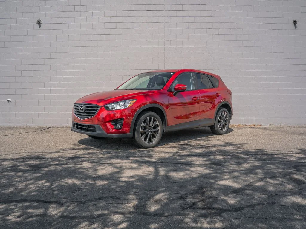 Used 2016 Red Metallic Mazda Grand Touring image 1