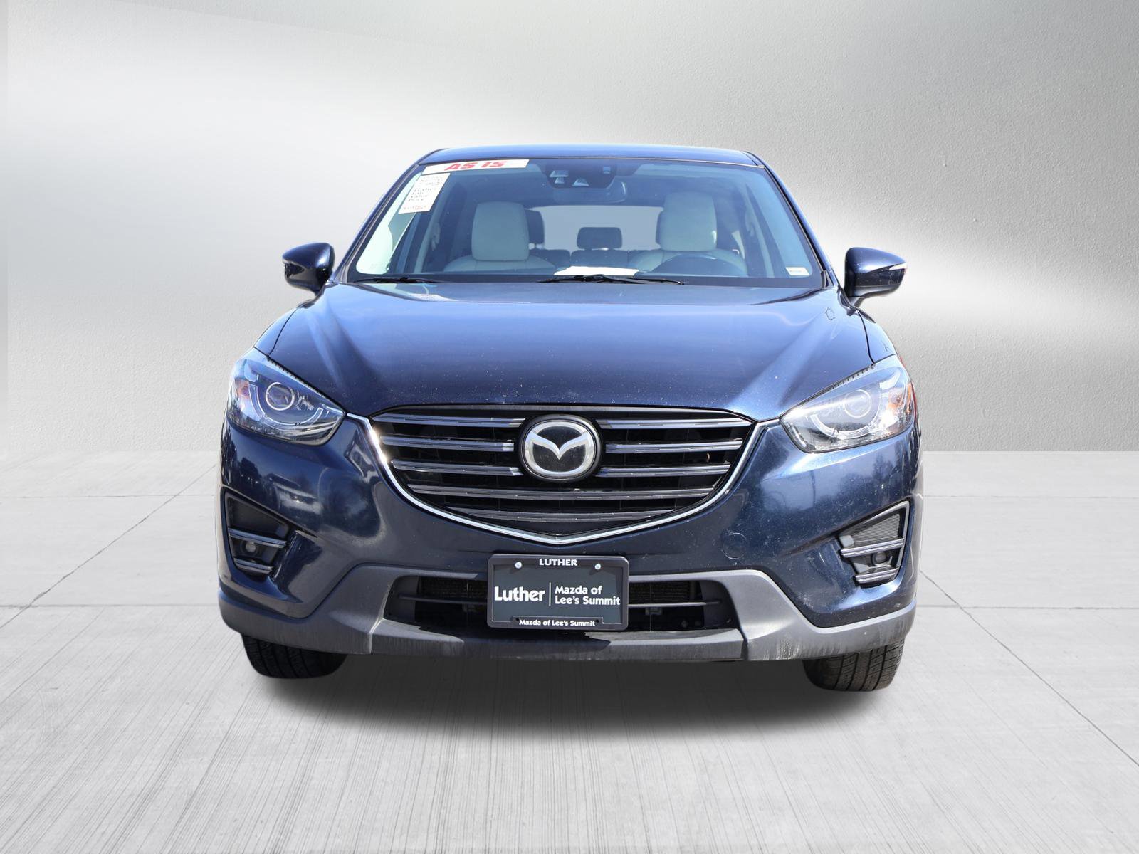 Used 2016 Mazda CX-5 Grand Touring with VIN JM3KE4DY7G0610464 for sale in Kansas City