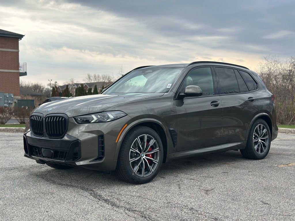 New 2026 Manhattan Green Metallic BMW xDrive50e image 3