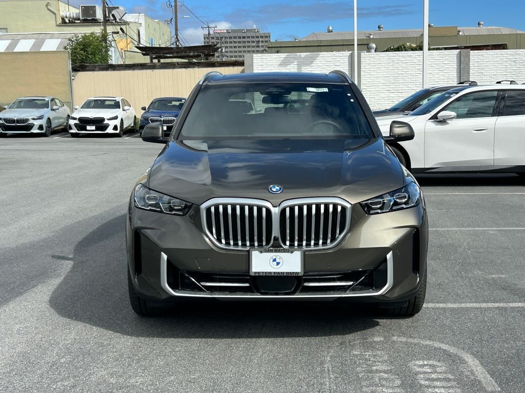 New 2026 Manhattan Green Metallic BMW xDrive50e image 8