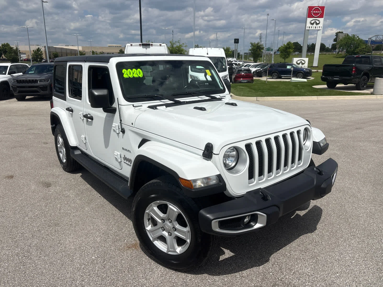 Used 2020 Jeep Wrangler Unlimited Sahara with VIN 1C4HJXEN3LW213619 for sale in Kansas City