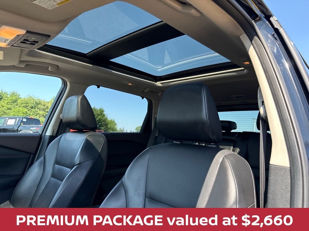 Used 2021 Super Black Nissan SV premium w/heated seats & panoramic roof image 2