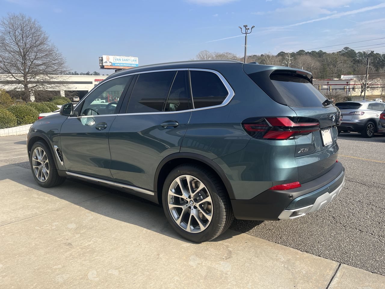 Used 2026 Blue Ridge Mountain Metallic BMW xDrive50e image 6