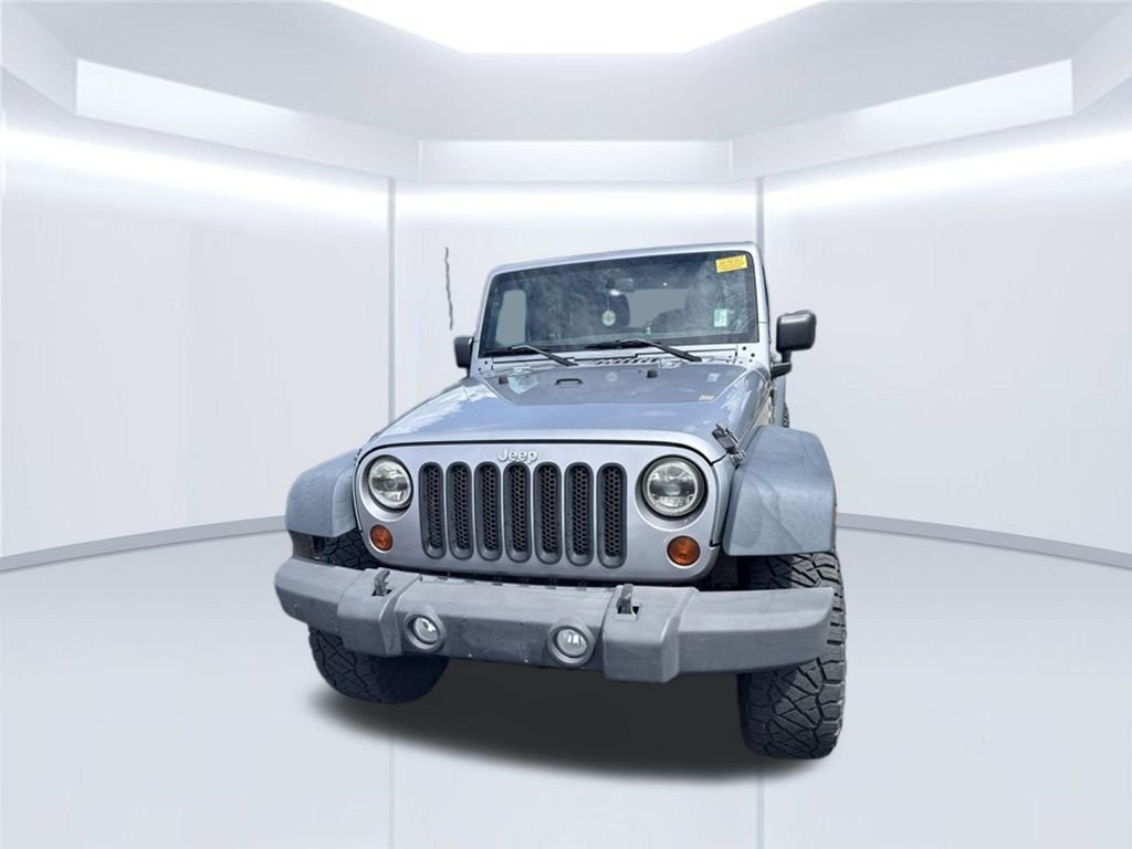 Used 2013 Jeep Wrangler Unlimited Sport with VIN 1C4BJWDG0DL701710 for sale in Milton, FL