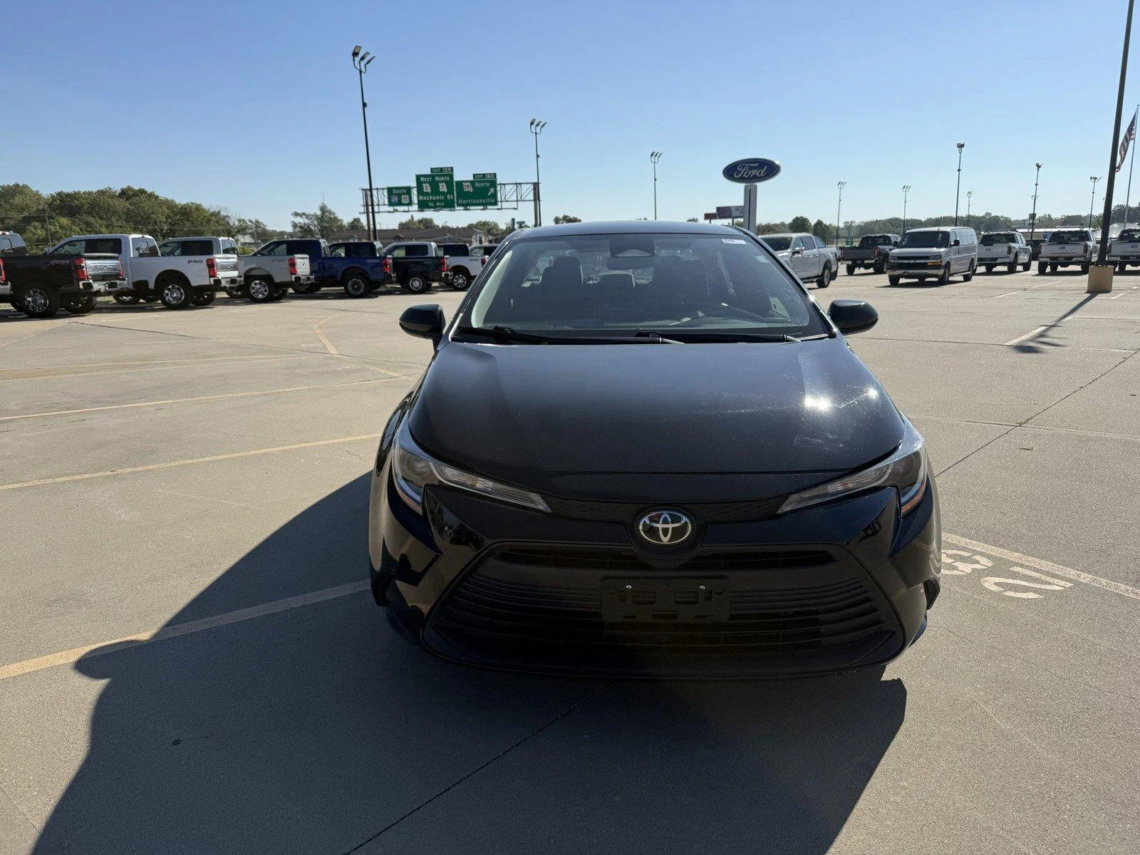Certified Used 2025 Midnight Black Metallic Toyota LE image 3