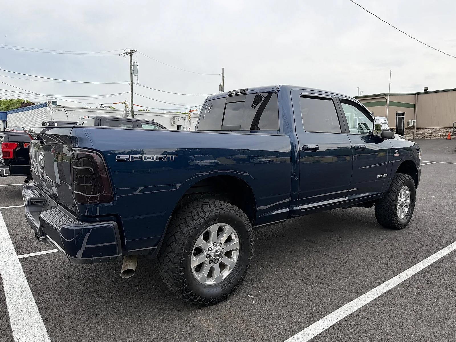 Used 2024 Patriot Blue Pearlcoat Ram Laramie image 3