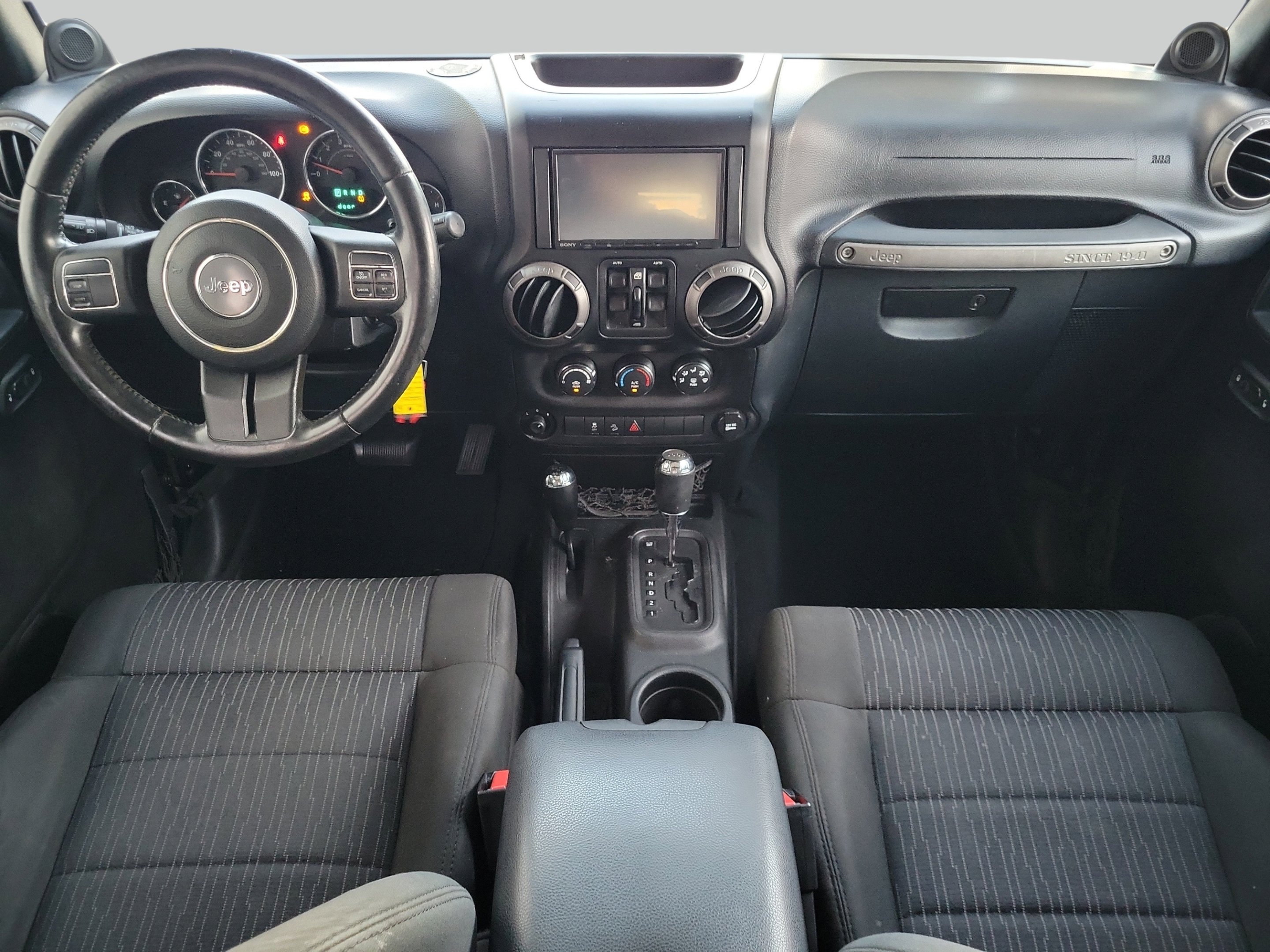Used 2011 Black ClearCoat Jeep Unlimited Sport image 15