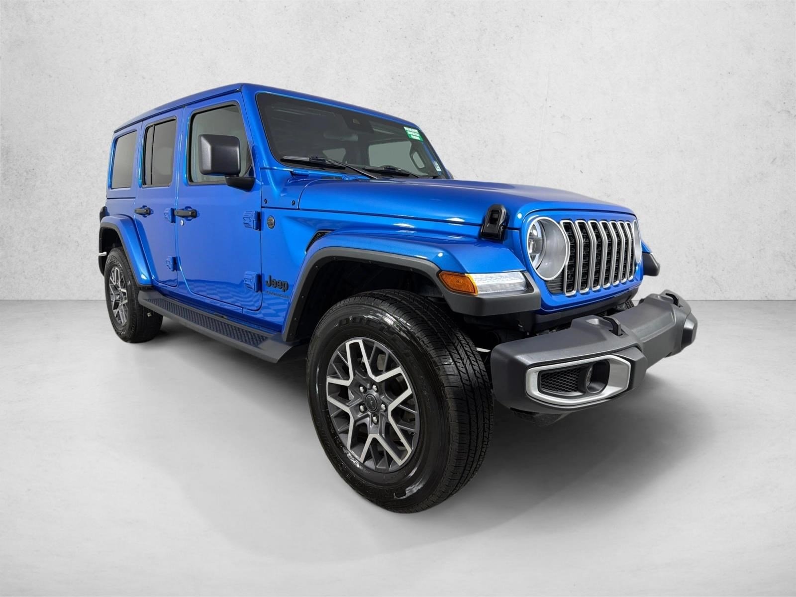 Used 2025 Hydro Blue Pearlcoat Jeep Sahara image 1