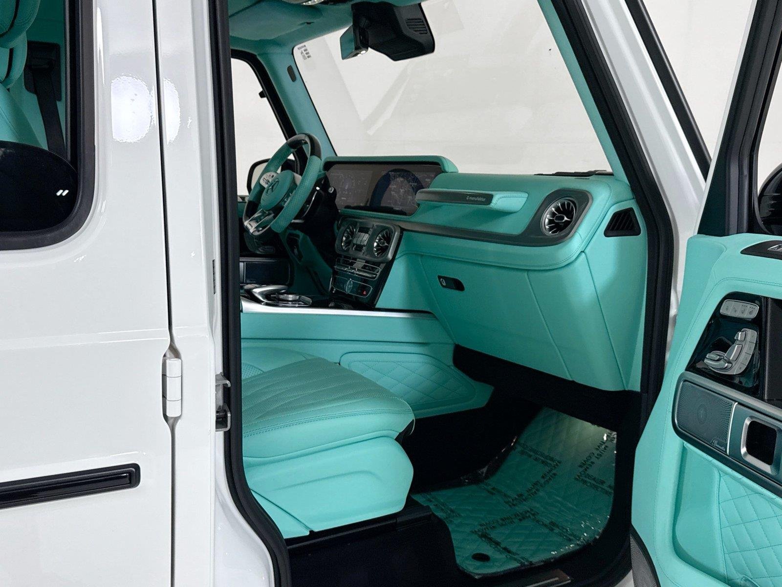 Used 2024 Polar White Mercedes-Benz AMG® G 63  Brabus Custom Widebody / Custom Tiffany Interior image 30