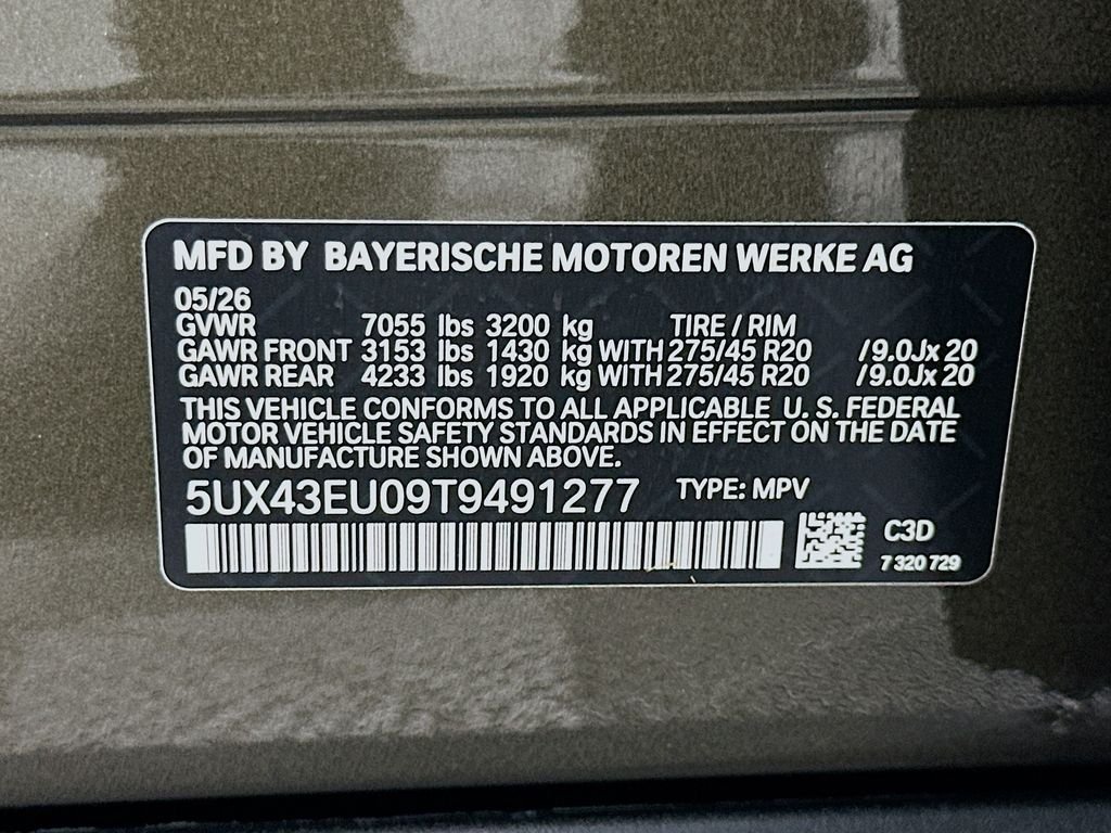 Used 2026 Manhattan Green Metallic BMW xDrive50e image 24