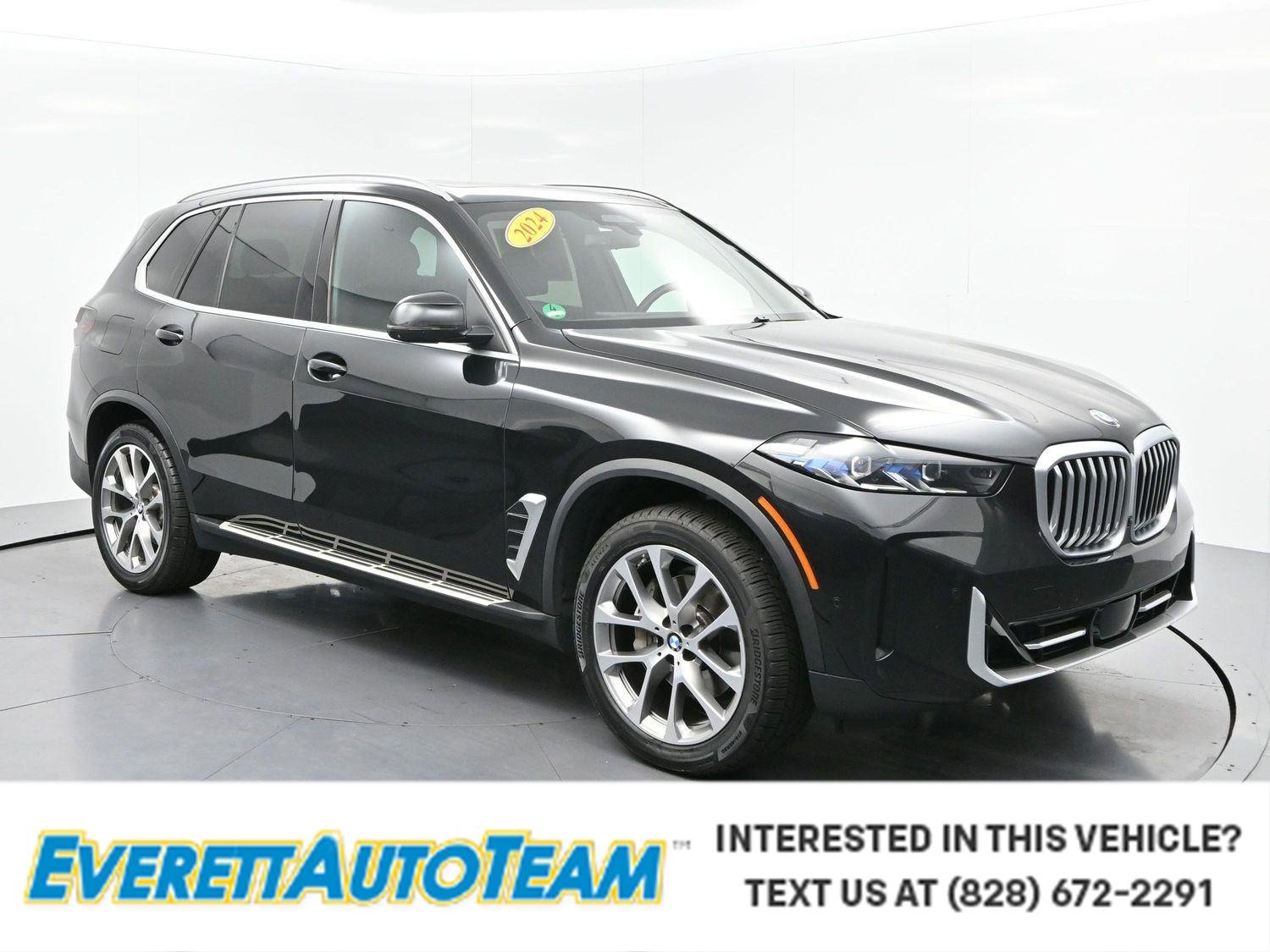 Used 2024 Carbon Black Metallic BMW xDrive40i image 1