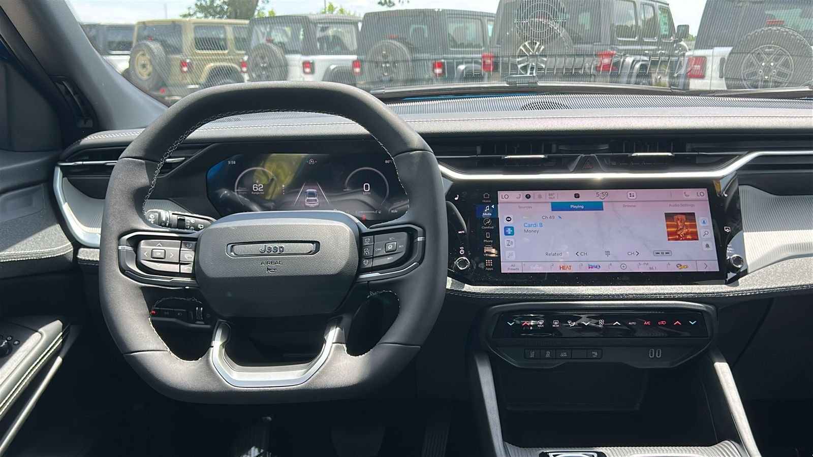 New 2026 Hydro Blue Pearlcoat Jeep Laredo image 13
