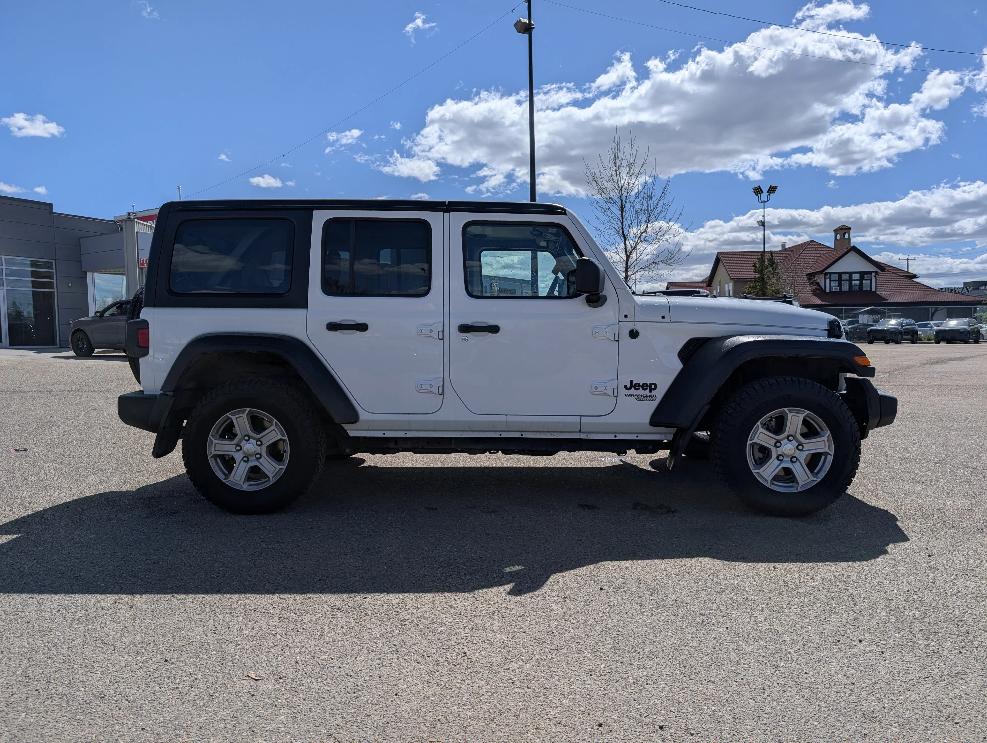 Used 2021 Bright White Jeep Unlimited Sport image 8