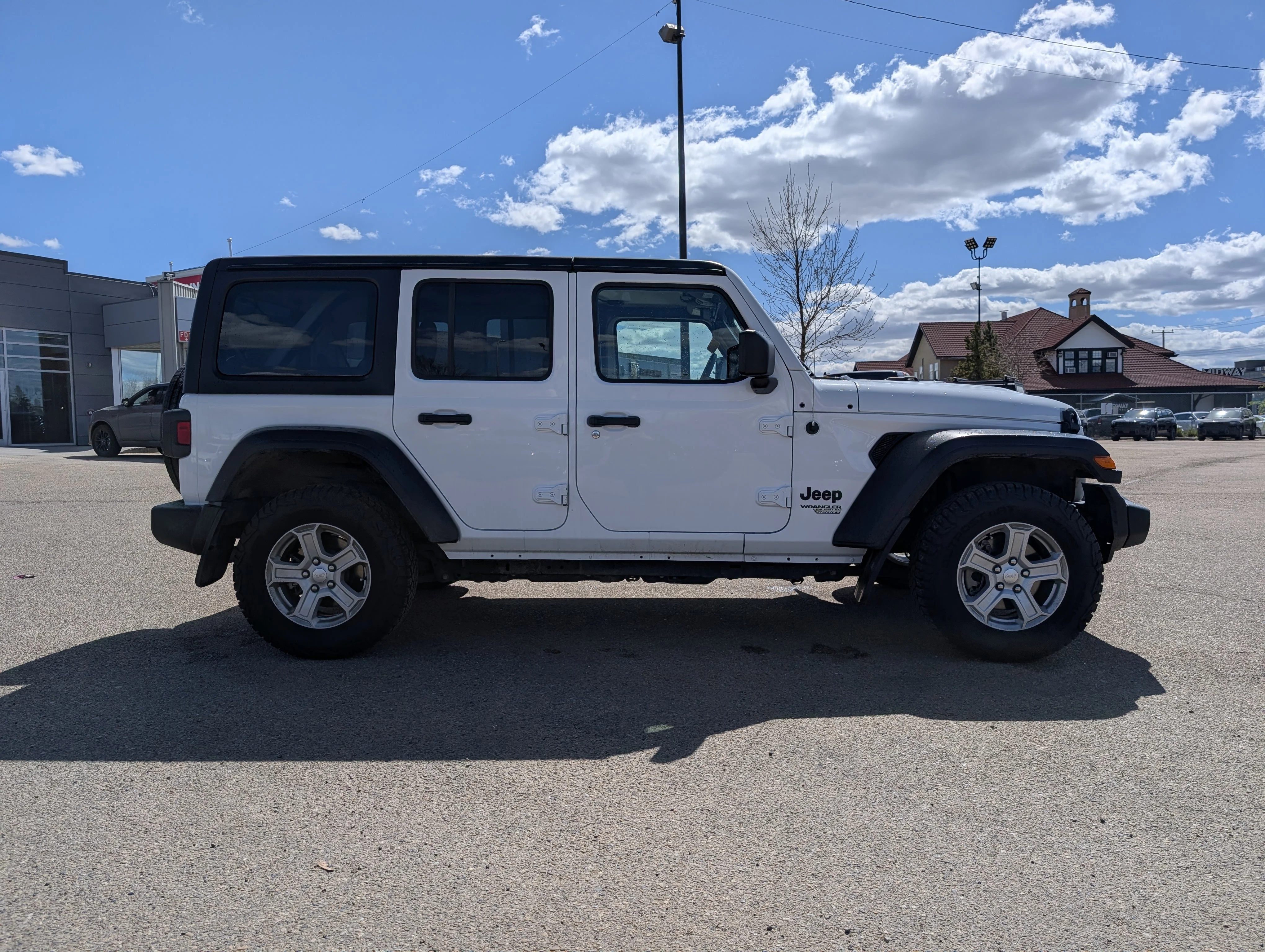 Used 2021 Bright White Jeep Unlimited Sport image 8