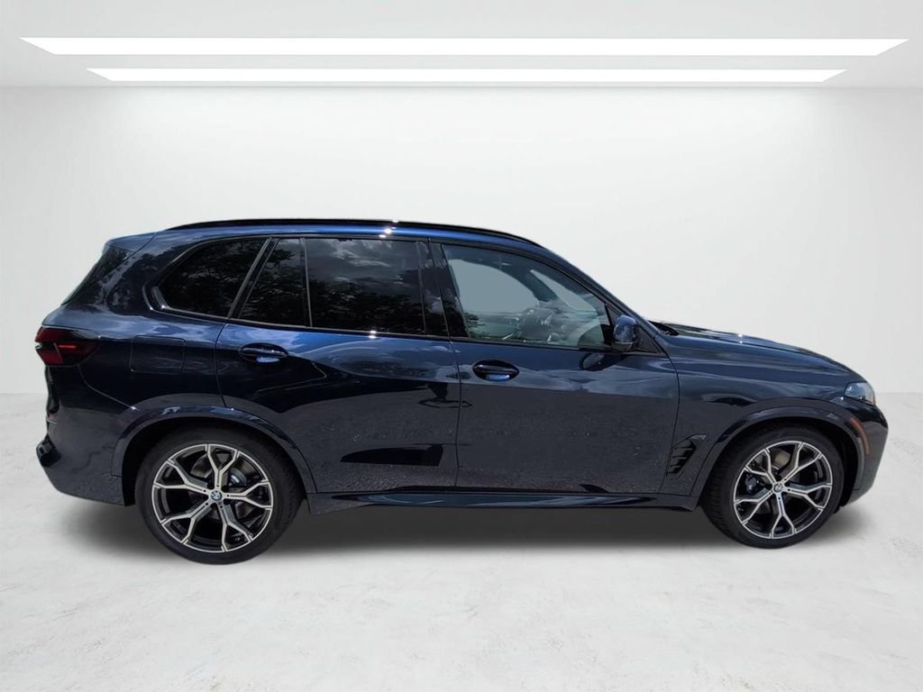 New 2026 Tanzanite Blue II Metallic BMW xDrive50e image 3