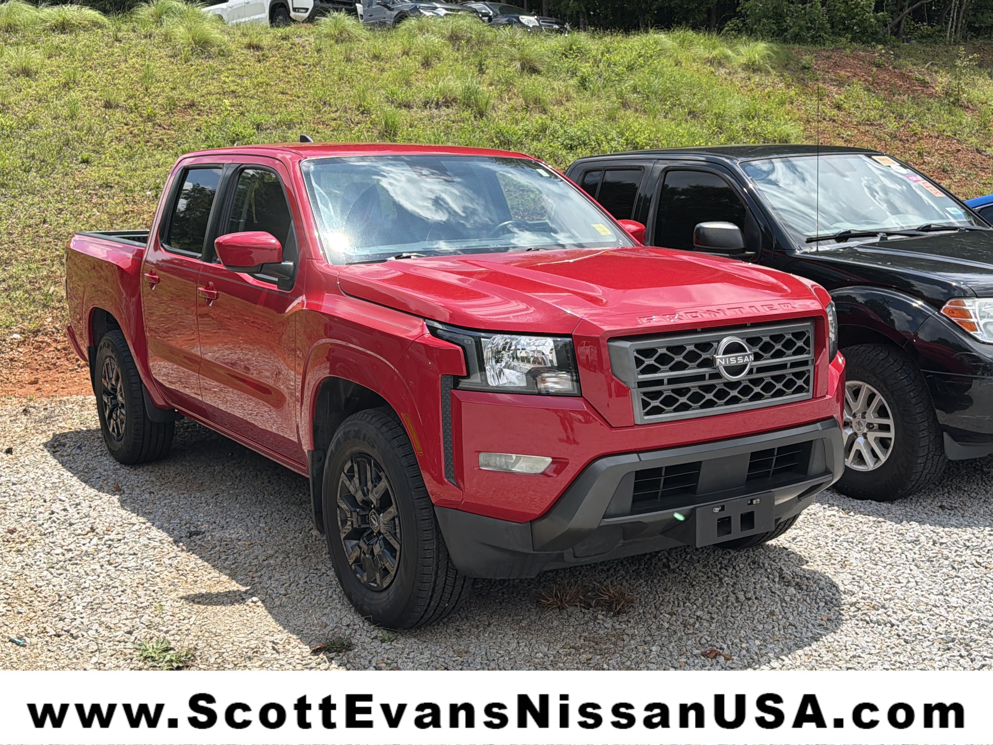 Used 2023 Red Alert Nissan SV image 1