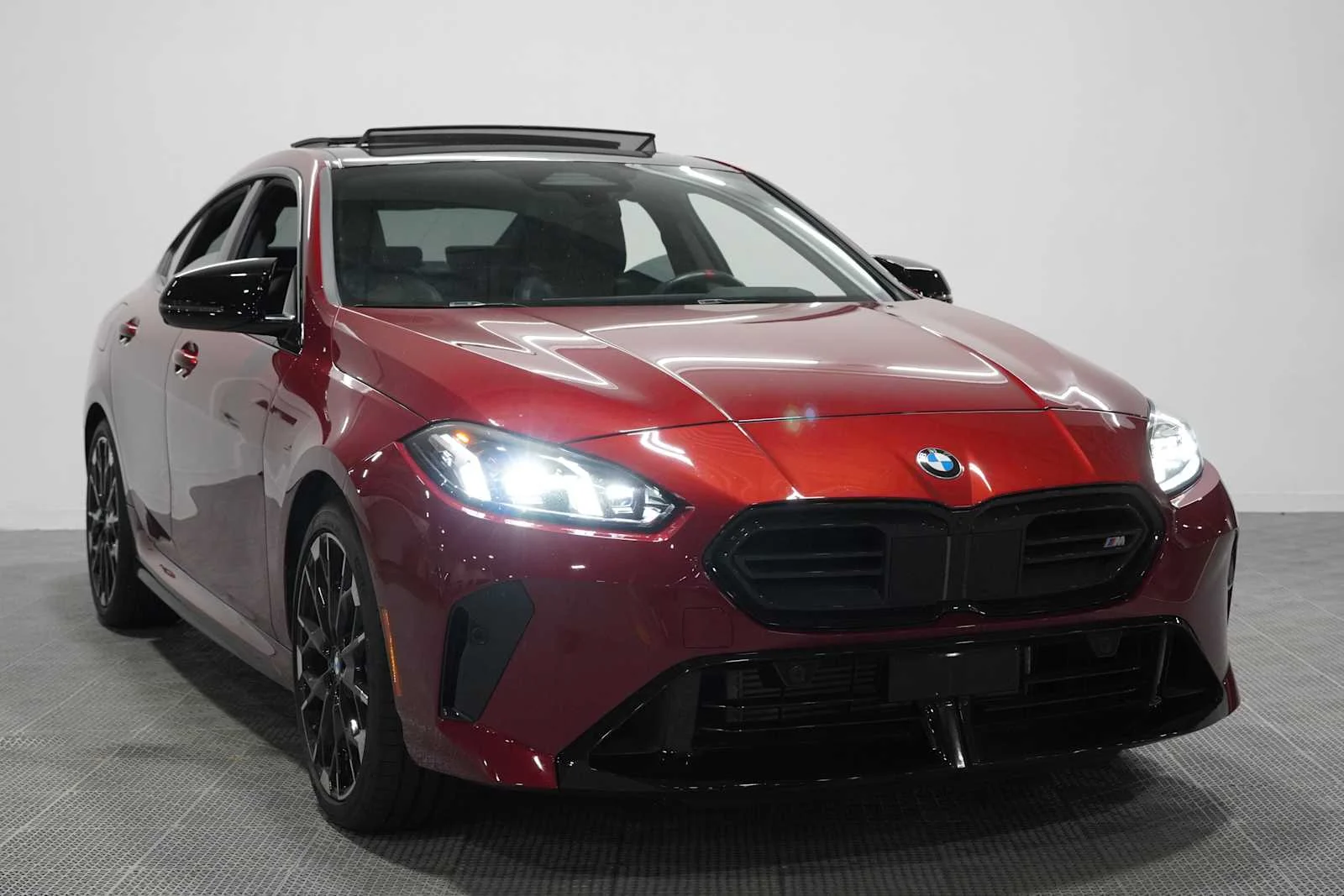 Used 2025 Vegas Red Metallic BMW M235 xDrive image 3