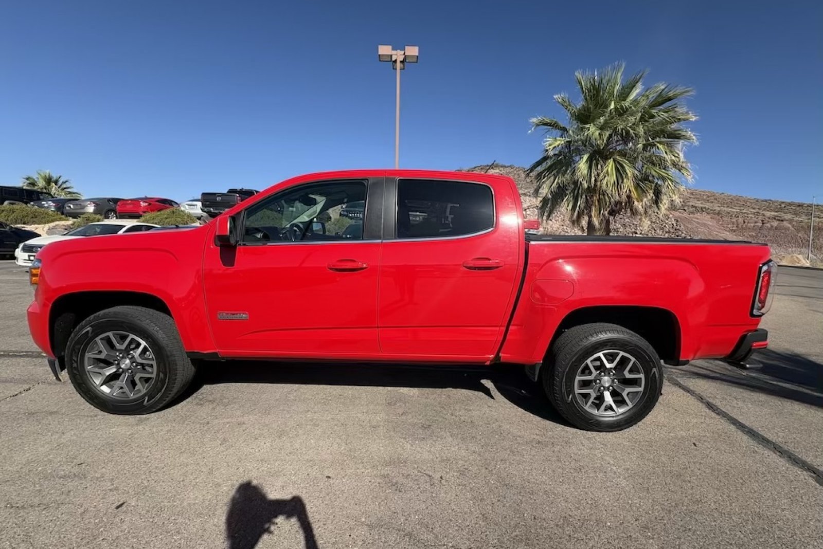 Used 2016 Cardinal Red GMC 4WD SLE image 2