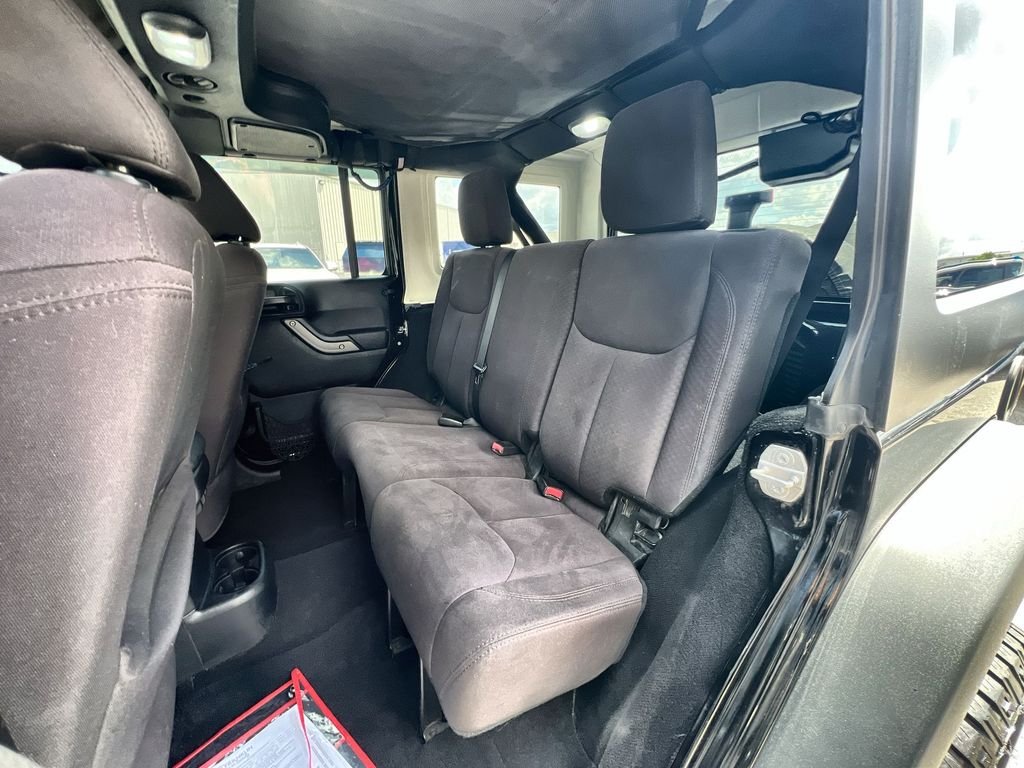 Used 2015 Black Jeep Unlimited Sport image 22