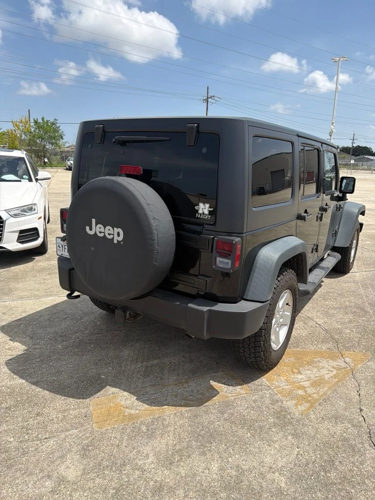 Used 2015 Jeep Wrangler Unlimited Sport with VIN 1C4BJWDG4FL503814 for sale in Harvey, LA