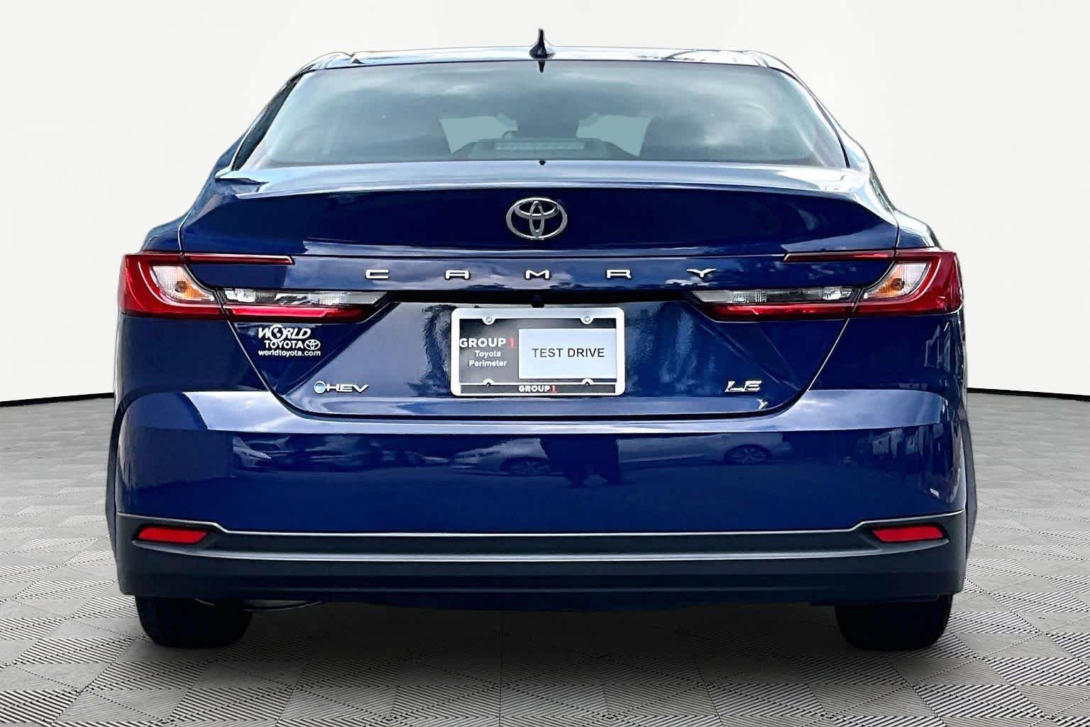 Used 2025 Reservoir Blue Toyota LE image 5