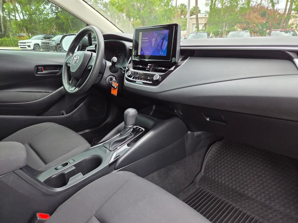 Used 2023 Midnight Black Metallic Toyota Hybrid LE image 14