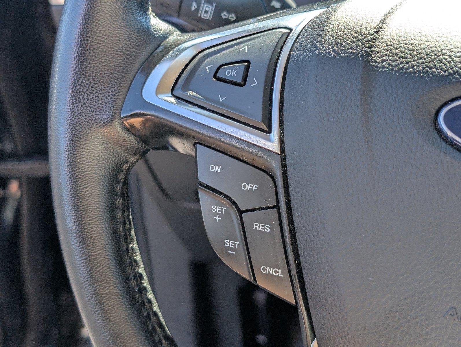 Used 2024 Stone Blue Ford Titanium image 30