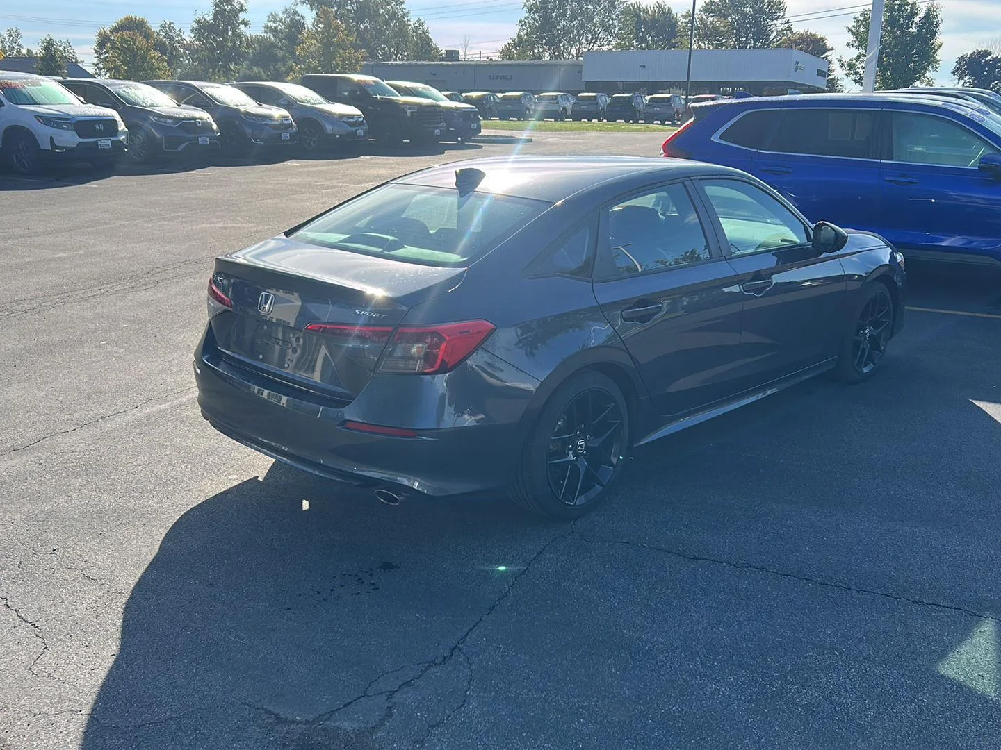 Used 2024 Meteorite Gray Metallic Honda Sport image 6