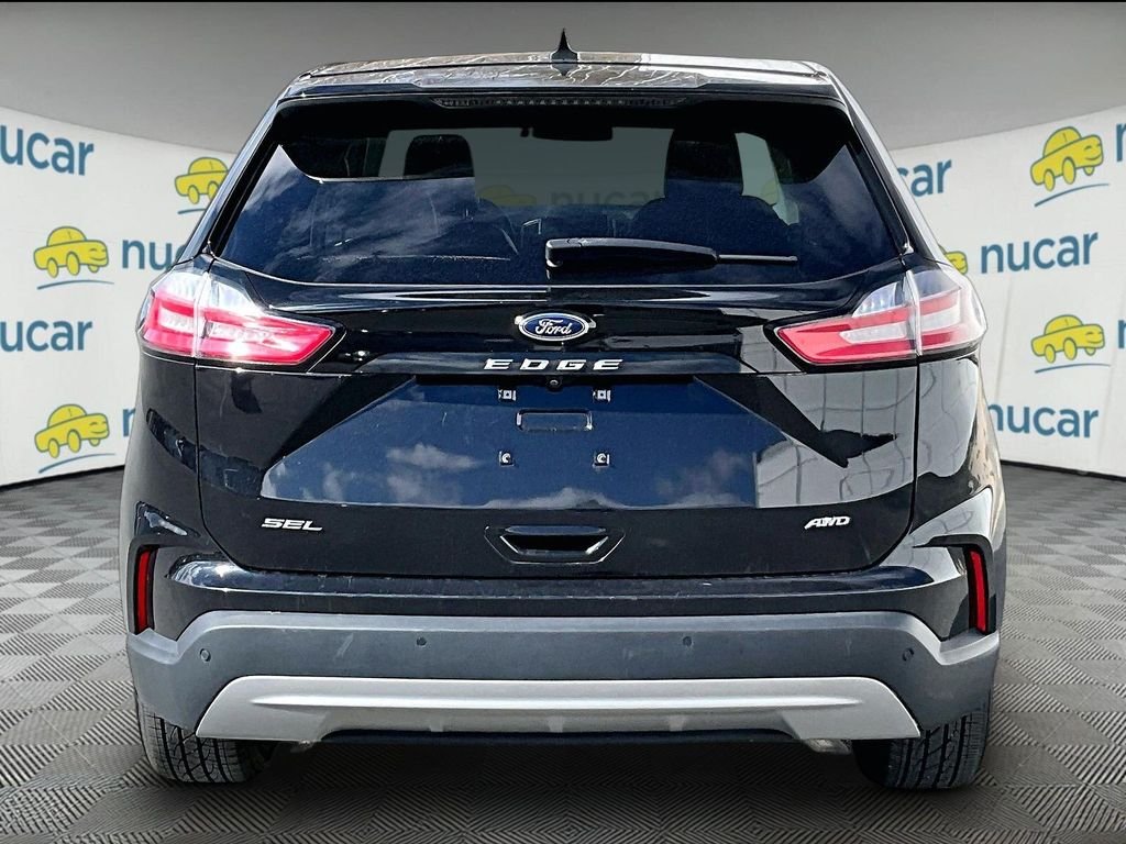 Used 2022 Black Metallic Ford SEL image 5