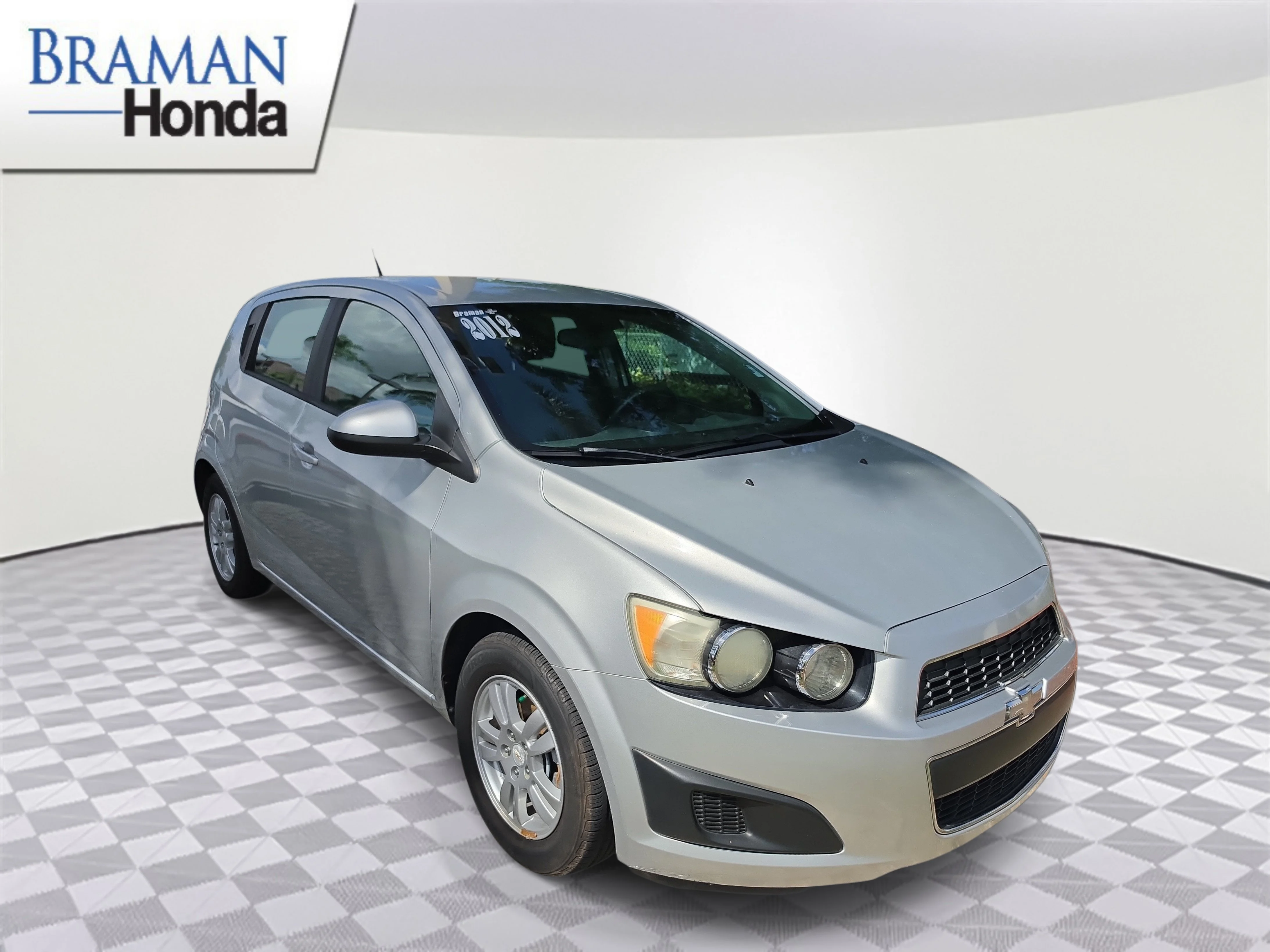 Used 2012 Chevrolet Sonic 1LS with VIN 1G1JB6SH0C4102537 for sale in Miami, FL