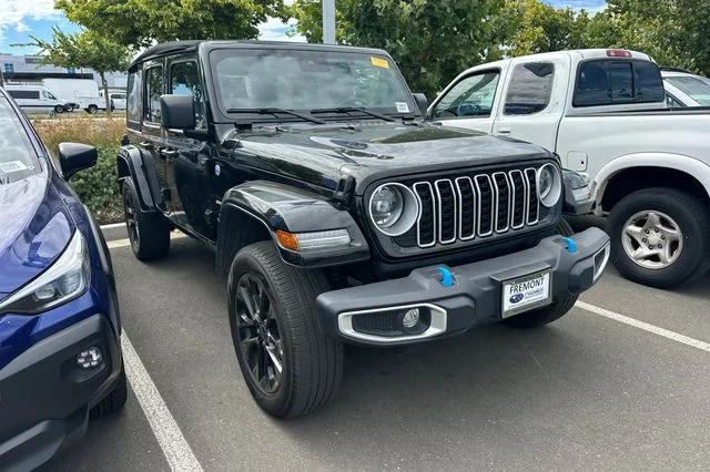 Used 2024 Black Jeep Sahara 4xe image 2