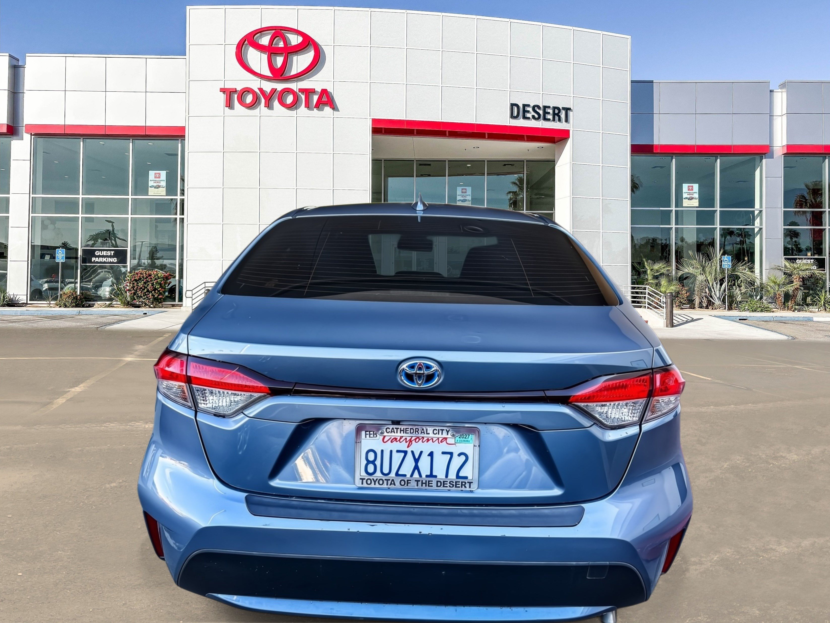 Used 2021 Super White Toyota Hybrid LE image 4