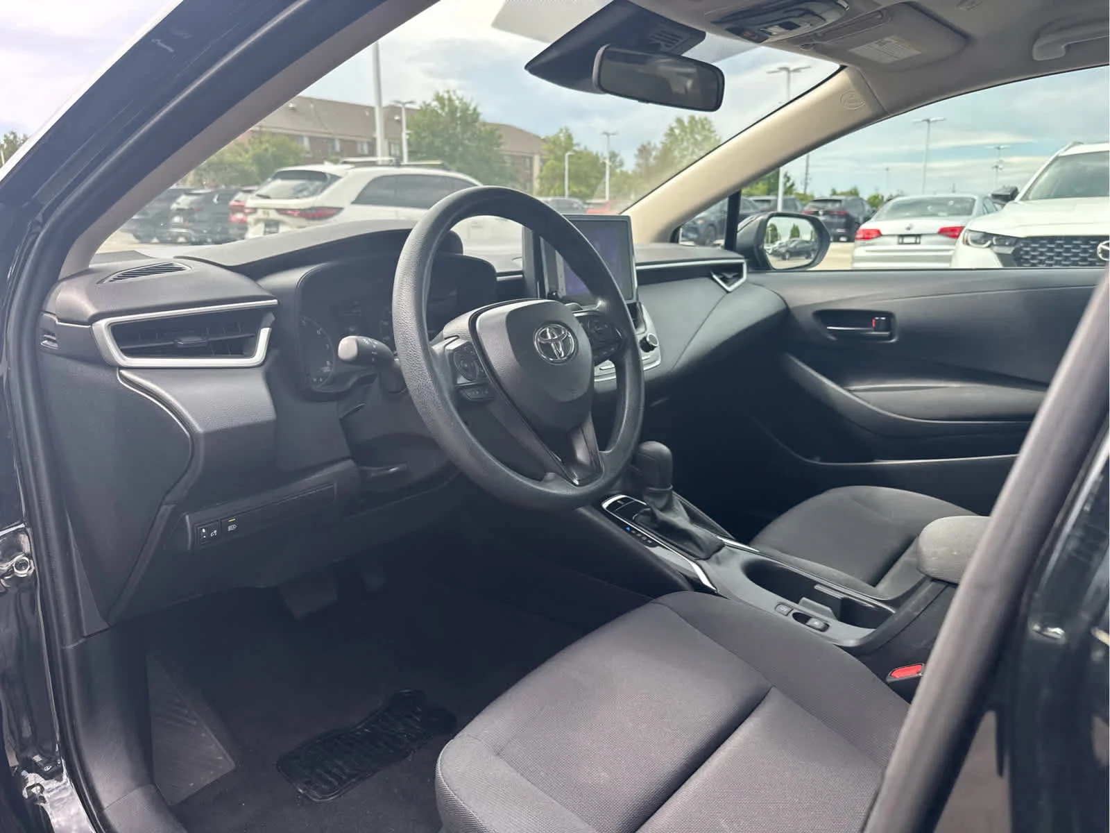 Used 2025 Midnight Black Metallic Toyota LE image 6