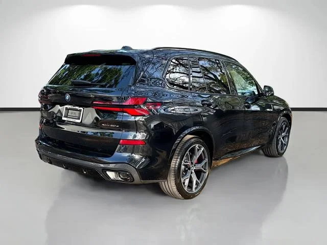 New 2026 Black Sapphire Metallic BMW xDrive50e image 3