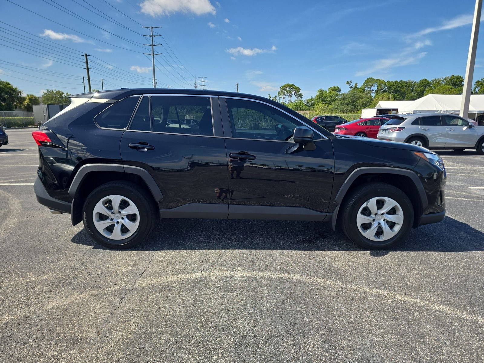Used 2024 Black Toyota LE image 3