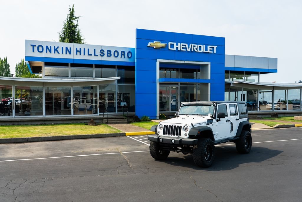 Used 2016 Bright White Clearcoat Jeep Unlimited Rubicon image 1