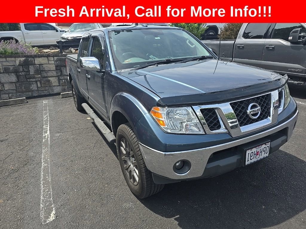 2013 Nissan Frontier 4.0 SL Crew Cab 4X4 AT LWB's photo