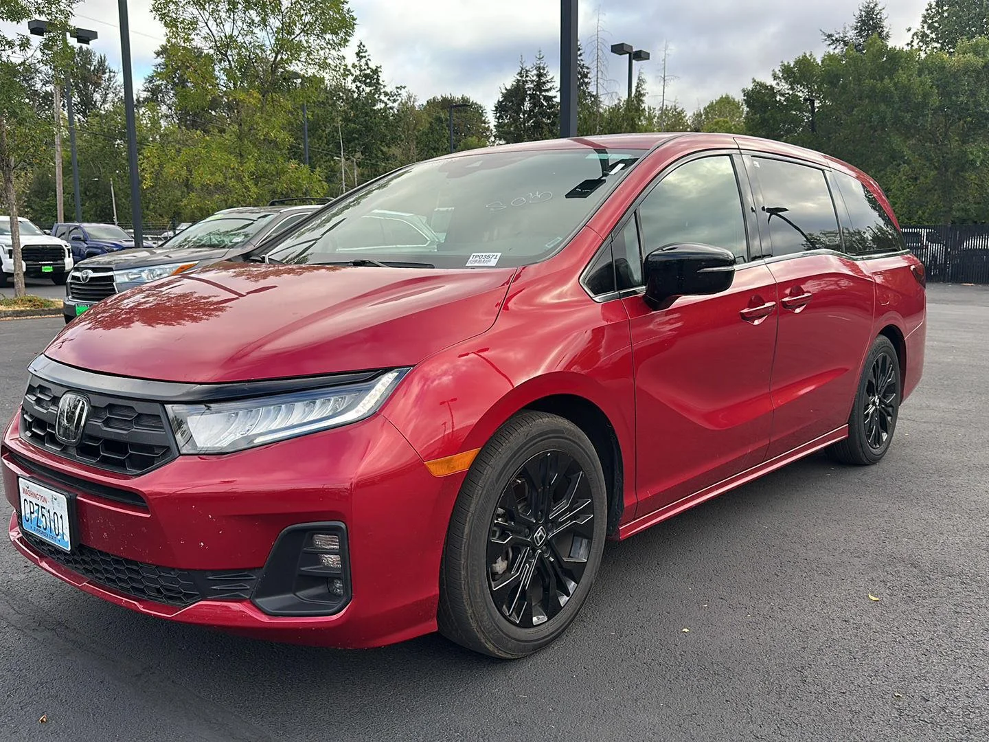 Used 2025 Radiant Red Metallic II Honda Sport-L image 1