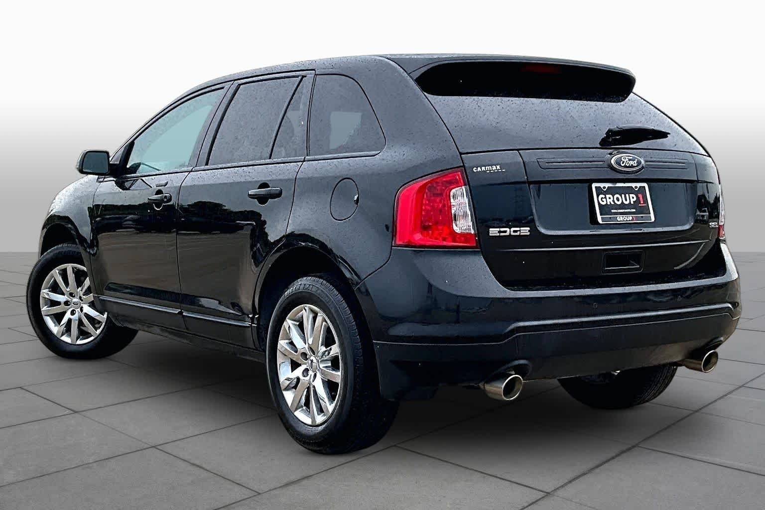 Used 2013 Tuxedo Black Metallic Ford SEL image 11